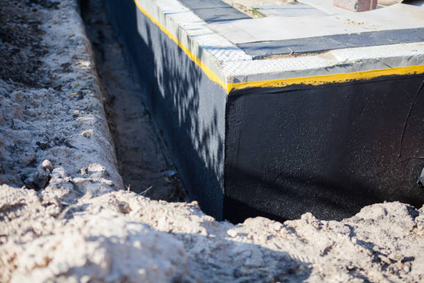 Professional Waterproofing technician working in Derby, NY